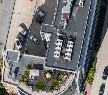 aerial-view-over-the-roof-of-building-and-terrace-2026-03-25-23-58-32-utc aerial-view-over-the-roof-of-building-and-terrace-2026-03-25-23-58-32-utc